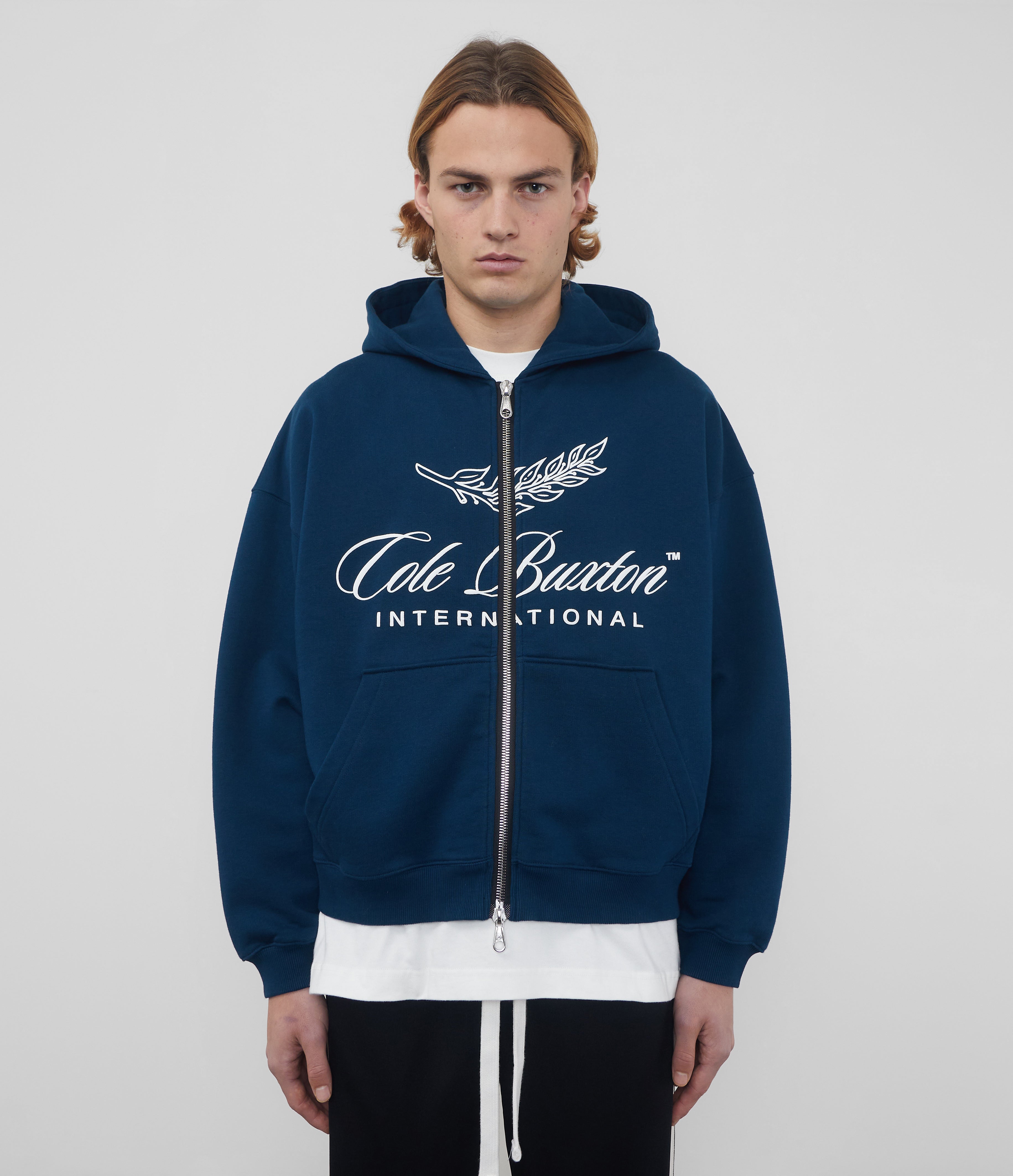 INTERNATIONAL ZIPPED HOODIE